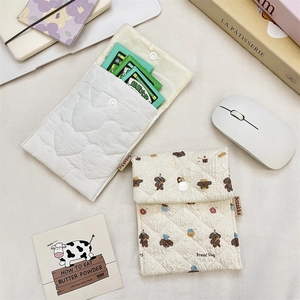 Quilted mini sanitary napkin storage pouch with dog print and snap button closure