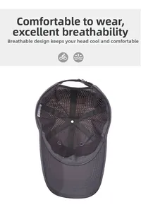 Close-up of the breathable mesh lining and adjustable strap inside the grey baseball cap