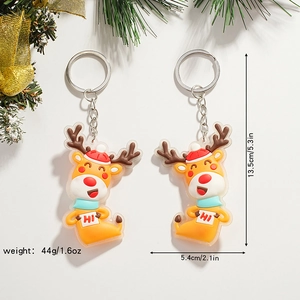 Christmas reindeer keychain set with cartoon PVC charms and silver metal rings
