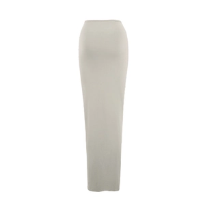 Detailed view of long beige maxi skirt with side slit and elegant slim fit texture