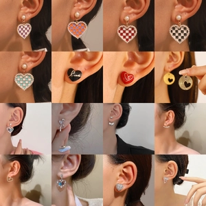 Collection of elegant heart earrings featuring velvet, checkered, and rhinestone designs
