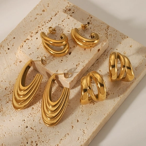 Three pairs of vintage 18K gold plated stainless steel chunky hoop and dangle earrings