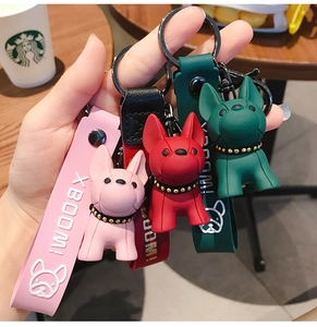 Fashionable French Bulldog keychains in pink, red, and green with stylish wrist straps