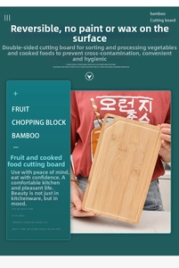 Close-up of double-sided bamboo cutting board with hanging hole for food classification