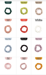 Grid view of 12 silk hair scrunchies in various colors with elegant satin textures