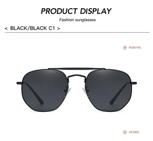 Close-up of black polarized lenses on polygonal metal frames with classic black C1 finish
