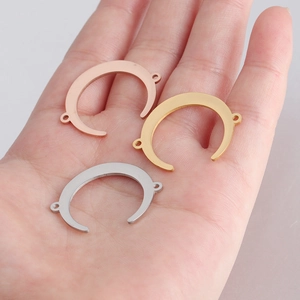 Polished stainless steel crescent moon connectors in rose gold, gold, and silver finishes