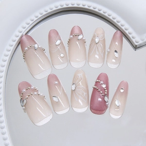 Cat eye press-on nails with 3D gradient butterfly and pearls in a soft aesthetic