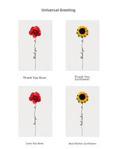 Detail of handmade fabric flower greeting cards with thank you and love you embroidery