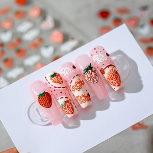 Pink and white strawberry nail stickers with long trapezoid shape on display card