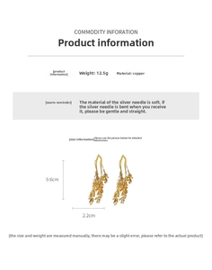 Golden wheat leaf tassel earrings dimensions 9.6cm x 2.2cm made of copper and silver needles