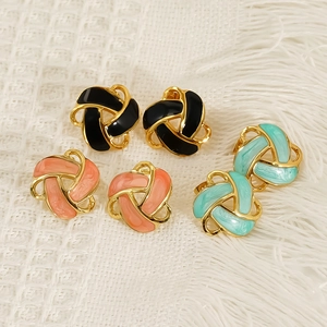 Three pairs of elegant enamel twist knot stud earrings in black, pink, and mint green