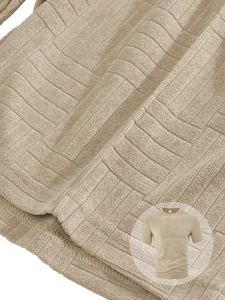 Macro shot of khaki men's casual shorts showing textured jacquard towel fabric details