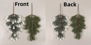 Front and back detail of artificial Christmas teardrop pine branch with snow effect