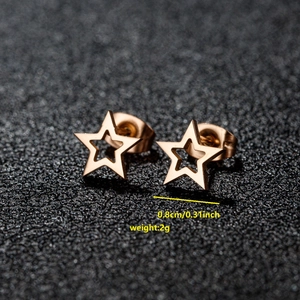 Minimalist hollow star stud earrings in rose gold stainless steel with dimension specs