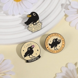 Creative geometric round crow enamel pins with witty quotes and gemstone accents