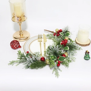 Elegant Christmas table wreath with pine needles, red berries and gold balls on white background