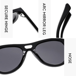 Detail view of double bridge sunglasses showing secure hinges and arc mirror legs