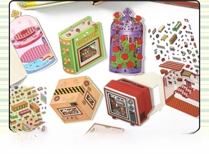 Detailed view of DIY 3D miniature house stickers with cookbook and vintage TV themes
