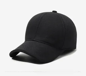Detail of black wool baseball cap featuring SPORTS embroidery and warm thick fabric