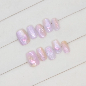 Short square aurora cat-eye press-on nails in light purple and pink with flame patterns