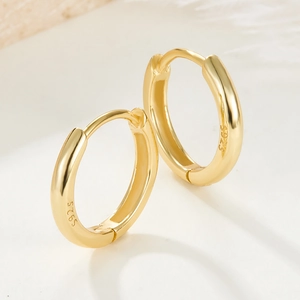Polished S925 sterling silver gold-plated hoop earrings with hallmark engraving
