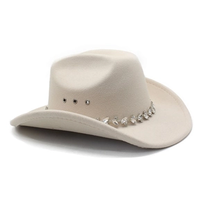 Detail view of cream cowboy hat featuring sparkling rhinestone band and metal eyelets