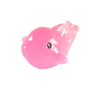 Miniature glowing pink dolphin figurine made of smooth resin for creative desktop decor