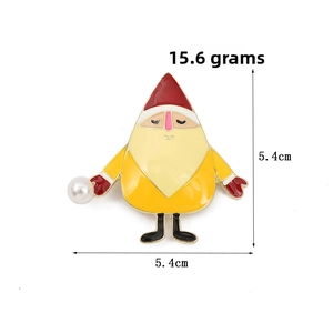 Detail of Santa Claus brooch with yellow enamel, white pearl, 5.4cm size and 15.6g weight