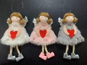 Three plush Christmas angel dolls with glitter wings and red hearts on dark background