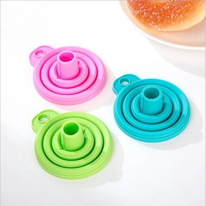 Set of three colorful collapsible silicone kitchen funnels in pink, blue, and green