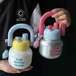 Dual-sip insulated bottles with U-shaped handles, heart charms and colorful lids