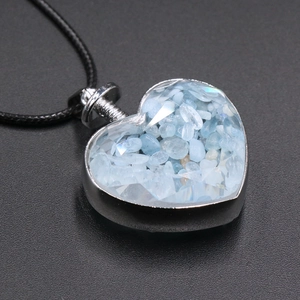 Heart wishing bottle necklace with light blue crystal stones and black cord strap