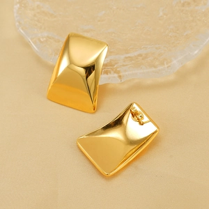 Polished 18K gold plated rectangular titanium steel stud earrings on a textured background