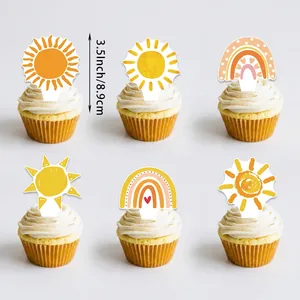 Close-up of 3.5-inch sunshine and rainbow themed cupcake toppers for birthday party
