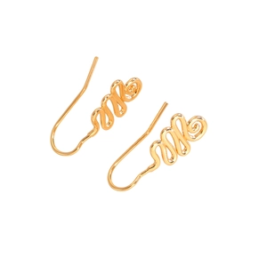 Detail of minimalist gold hoop earrings featuring elegant wire-wrapped wave design