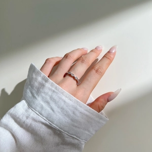 Detailed close-up of S925 sterling silver ring with five marquise-cut zircon stones