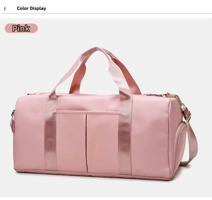 Pink waterproof yoga fitness bag featuring side shoe compartment and adjustable strap