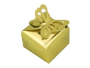 Close-up of golden hollow butterfly wedding candy box with a pearlized finish