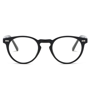 Retro polarized round black frame sunglasses with decorative silver bone studs