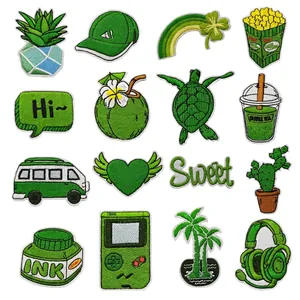 Close-up of a 16-piece set of green nature and lifestyle themed embroidered patches