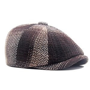 Classic dark brown herringbone newsboy cap in textured wool fabric for autumn and winter