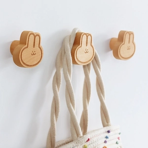 Minimalist wooden bunny wall hook made of natural beech wood for entryway organization