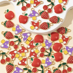 Colorful enamel fruit pendants featuring strawberry, apple, cherry and mushroom designs