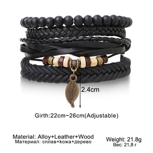 Detailed close-up of a 5-layer men's braided leather bracelet with bronze leaf pendant