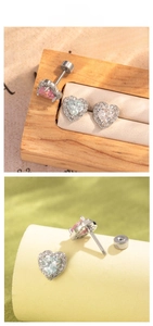Detail of heart-shaped zircon earrings with pink, blue and clear stones and screw backs