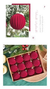 Detail of 6cm burgundy velvet Christmas balls with mixed vertical stripes and smooth textures