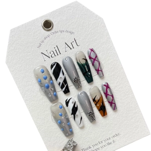 Handmade press-on nails with flame art and gothic metal cross in long coffin shape