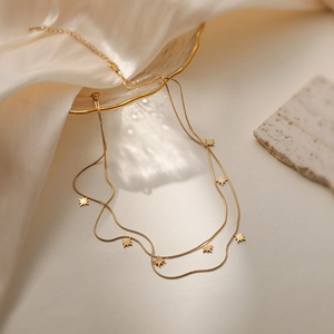 18K gold plated double layer stainless steel necklace featuring small star pendants