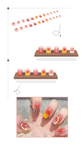 Detail of 3D embossed lemon press-on nails with summer gradient and fruit slices